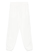 Pantaloni sportivi per bambino Stella McCartney Kids bianco con zip e decorazione sulla manica - Rubino Kids