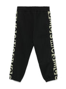 Pantaloni sportivi per bambino Stella McCartney Kids neri con logo jacquard - Rubino Kids