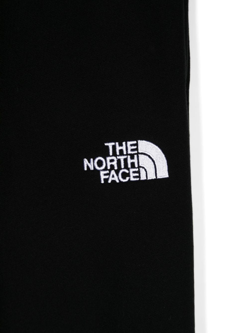 Pantaloni sportivi per bambino The North Face nero con ricamo logo sulla gamba - Rubino Kids