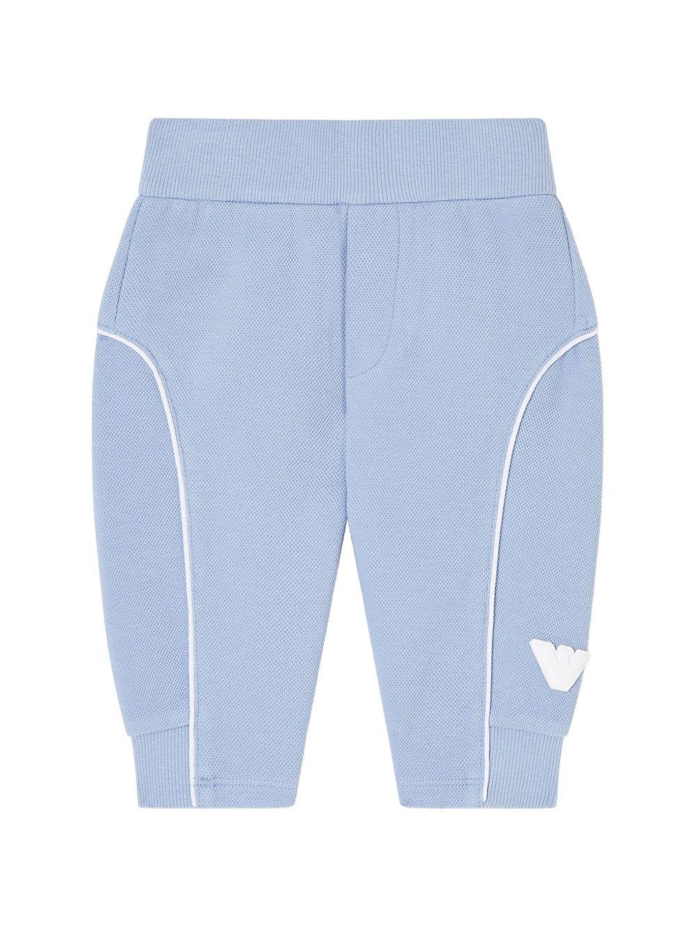 Pantaloni sportivi per neonato Emporio Armani Kids azzurro con logo aquila sul davanti - Rubino Kids