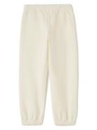 Pantaloni sportivi The Palm per bambino Palm Angels Kids bianco con gamba affusolata - Rubino Kids