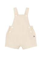 Salopette per neonati Petit Bateau beige con bretelle - Rubino Kids
