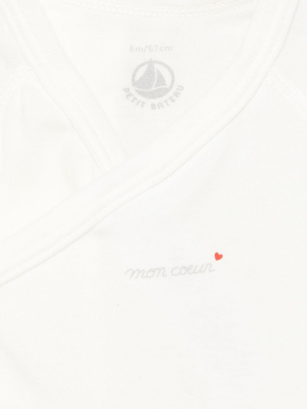 Set di cinque tutine per neonati Petit Bateau bianche con scollo a V - Rubino Kids