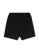 Shorts con bottoni incisi a moneta per bambina Balmain Kids nero con firma color argento - Rubino Kids