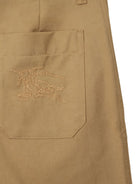 Shorts con spacchi frontali per bambino Burberry Kids beige con due tasche laterali a filetto - Rubino Kids