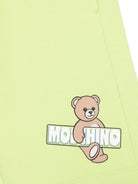 Shorts per bambino Moschino Kids verde con stampa grafica - Rubino Kids