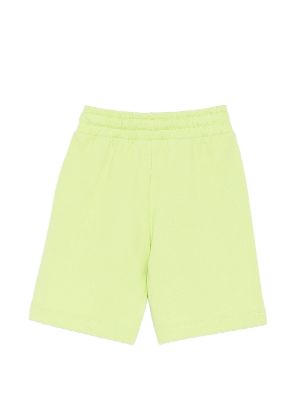 Shorts per bambino Moschino Kids verde con stampa grafica - Rubino Kids