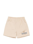 Shorts per neonati Moschino Kids beige con logo sul davanti - Rubino Kids