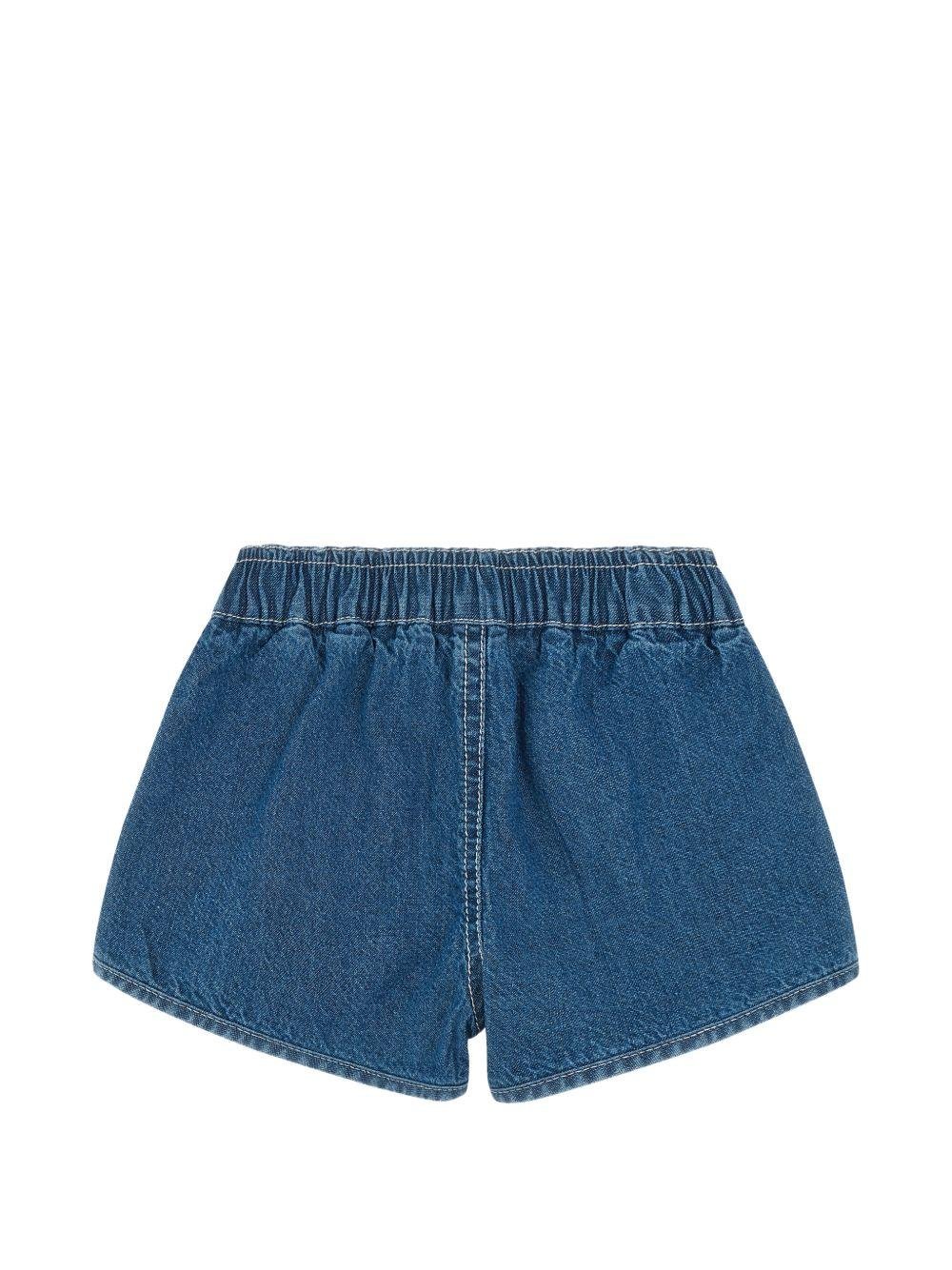Shorts per neonati Moschino Kids in denim con stampa - Rubino Kids