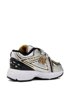 Sneakers 1906 per bambino New Balance Kids grigie con inserti a contrasto - Rubino Kids