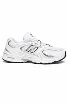 Sneakers 530 per bambini New Balance Kids bianche con design a inserti grigi - Rubino Kids