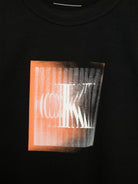 T-shirt con stampa per bambino Calvin Klein Kids nero con orlo dritto - Rubino Kids