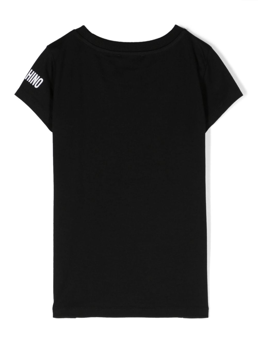 T shirt nera per bambina Moschino Kids con stampa centrale bianca "Be Simple!" - Rubino Kids