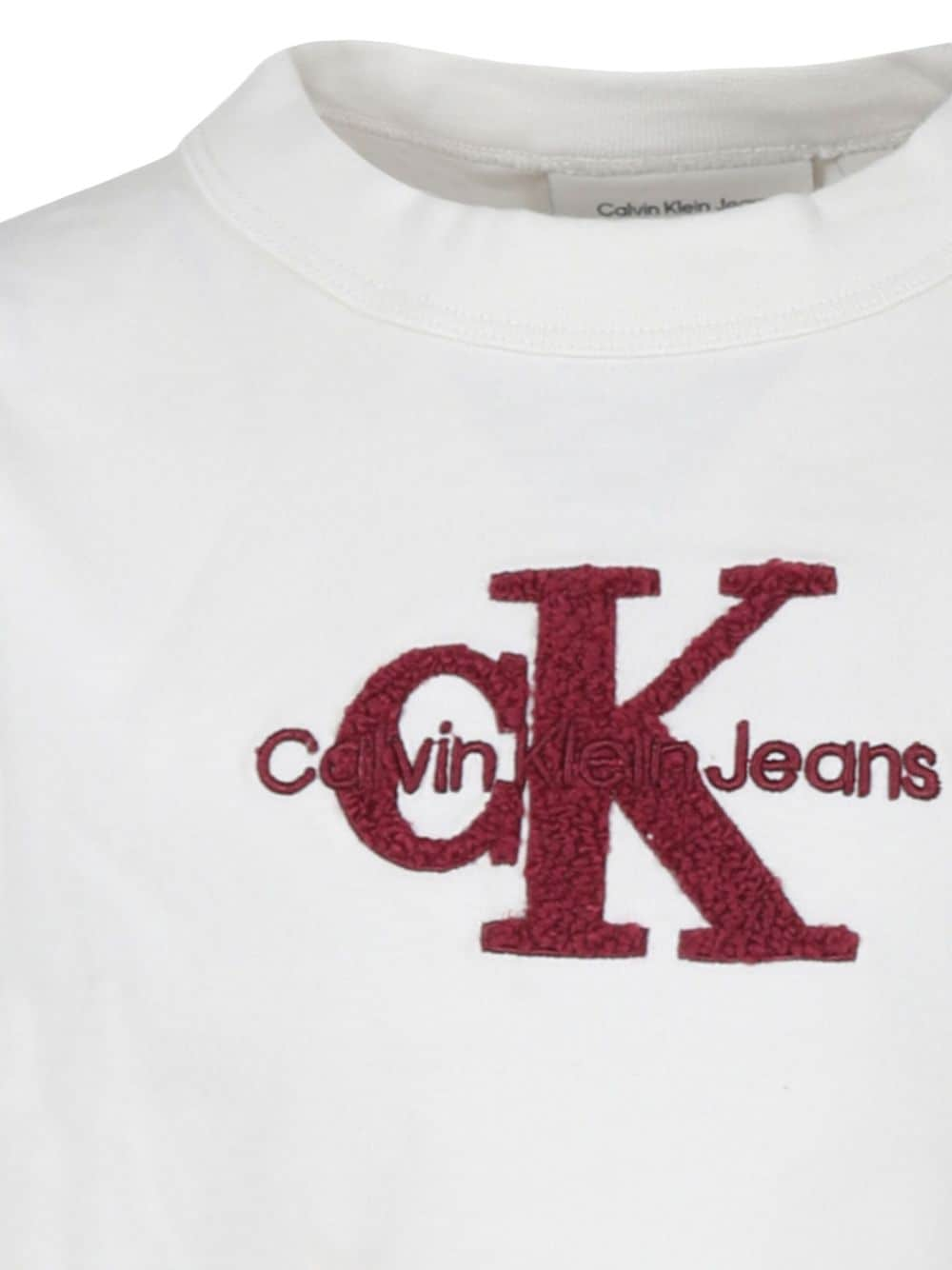 T-shirt per bambina Calvin Klein Kids bianco con ricamo logo sul davanti - Rubino Kids