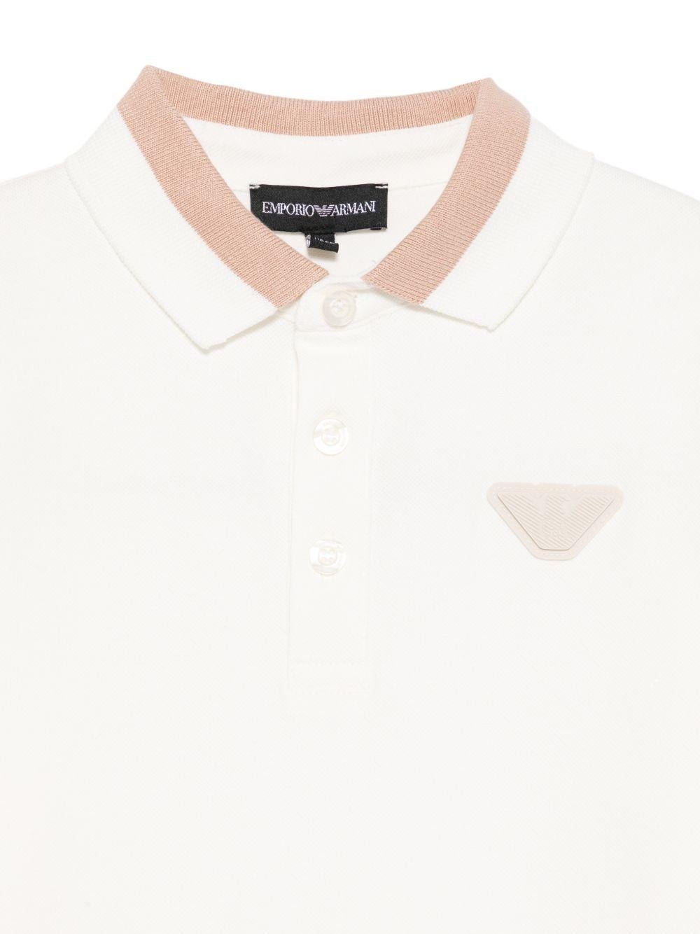 T-shirt per bambino Emporio Armani Kids beige con logo aquila sul davanti - Rubino Kids