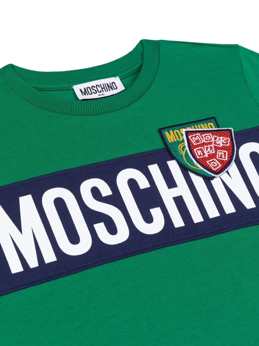 T-shirt per bambino Moschino Kids verde con stampa logo e scudetti - Rubino Kids