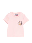 T-shirt per neonata Moschino Kids rosa con logo sul davanti - Rubino Kids