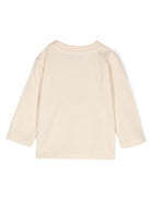 T-shirt per neonati Moschino Kids beige a maniche lunghe con stampa logo - Rubino Kids