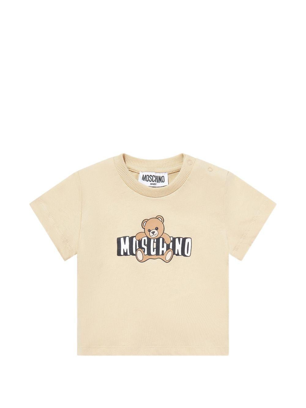 T-shirt per neonati Moschino Kids beige con logo sul davanti - Rubino Kids