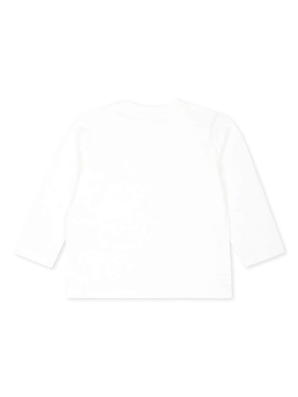 T-shirt per neonati Moschino Kids bianco a maniche lunghe con stampa logo - Rubino Kids