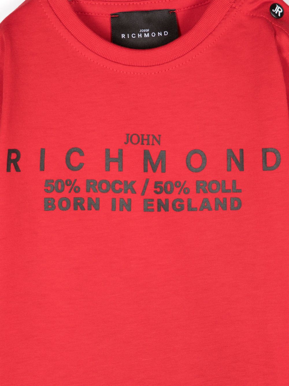 T shirt per neonato rossa con stampa logo RICHMOND centrale 50% Rock & Roll centrale - Rubino Kids