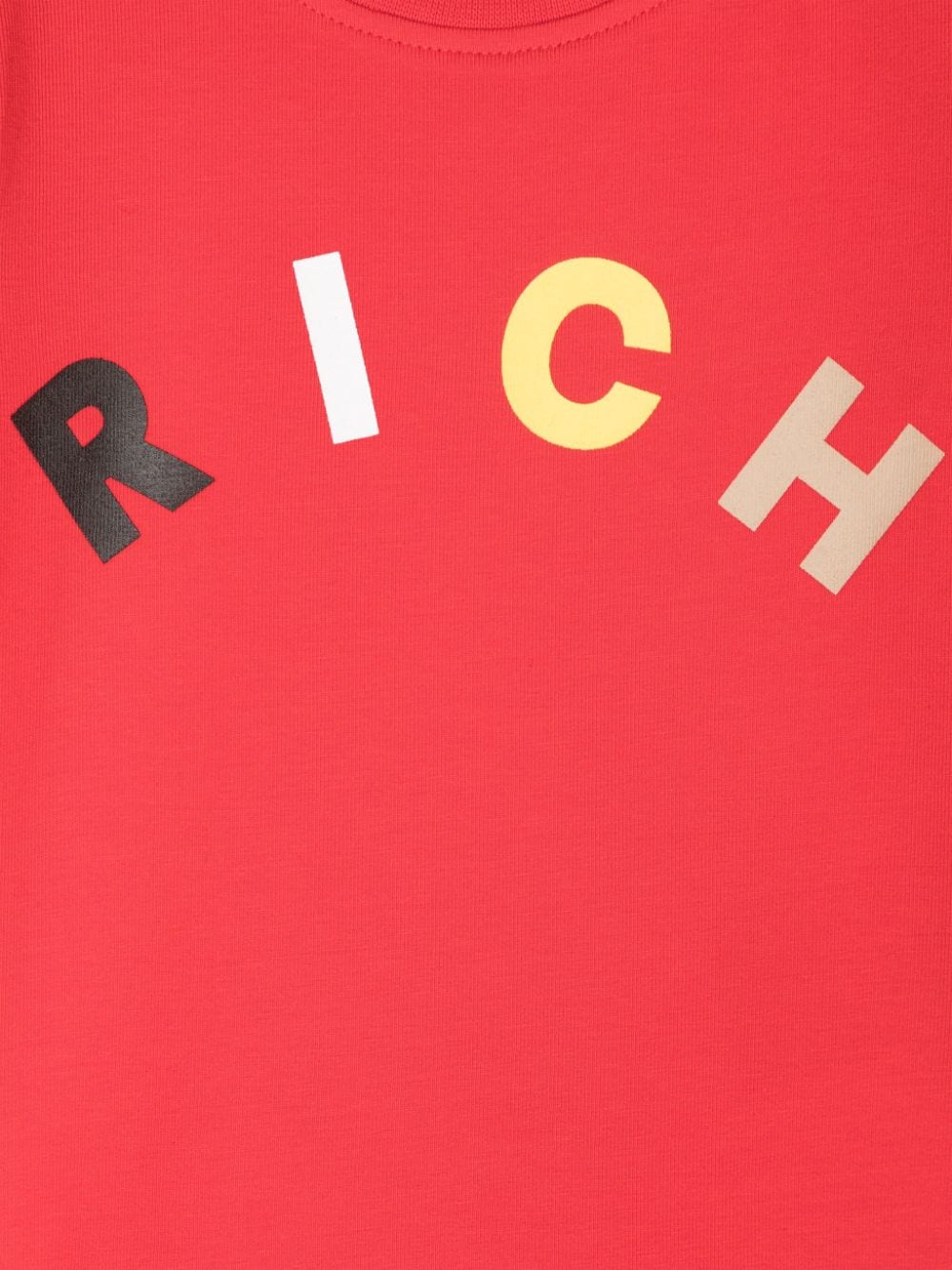 T shirt per neonato rossa John Richmond con stampa RICH multicolor centrale ad arco - Rubino Kids