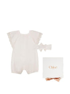 Tuta corta e fascia per capelli per neonata Chloé Kids bianche con bordo in pizzo - Rubino Kids
