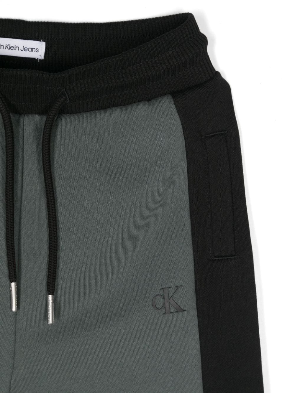 Tuta sportiva per bambino Calvin Klein Kids nero con logo gommato - Rubino Kids