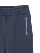 Tuta sportiva per bambino Emporio Armani Kids blu con stampa logo all - over - Rubino Kids