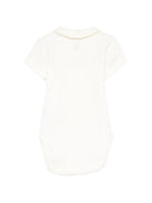 Tutina per neonati Petit Bateau bianca con colletto alla Peter Pan - Rubino Kids